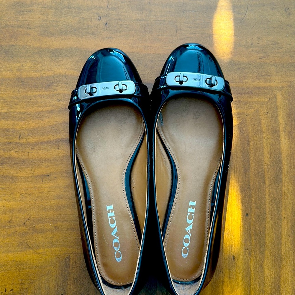 Coach shoes, black patten leather shoes.